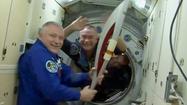 The Olympic torch spacewalk: Watch it live, here