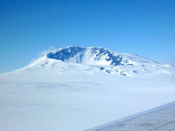 Mt. Sidley is the youngest of a chain of volcanoes looms over the ice sheet in Marie Byrd Land in western Antarctica. (Douglas Wiens / Washington University, St. Louis / December 11, 2011)
