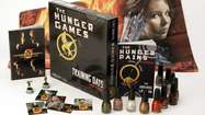 Ad campaign (lip) glosses over 'Hunger Games' message
