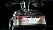 Tesla Motors plans to debut cheaper car in early 2015