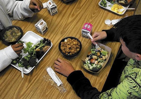 Students eat a healthy lunch at Marston Middle School in San Diego