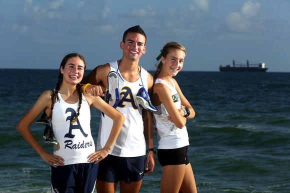 Cross country runners of the year: Alexa Cruz, Manuel Velasquez, Julia Montgomery.  Mike Stocker, Sun Sentinel