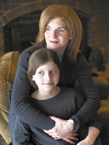 “We rarely fly ... It’s a nerve-wracking experience,” said Amy Wicker, with her daughter Elyse, 9, who has severe allergies to nuts. Wicker said she’s always uncertain about whether flight attendants and fellow passengers will cooperate to keep her daughter safe.