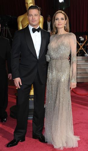 Angelina Jolie and Brad Pitt seemed to skirt E!'s red-carpet fashion police.