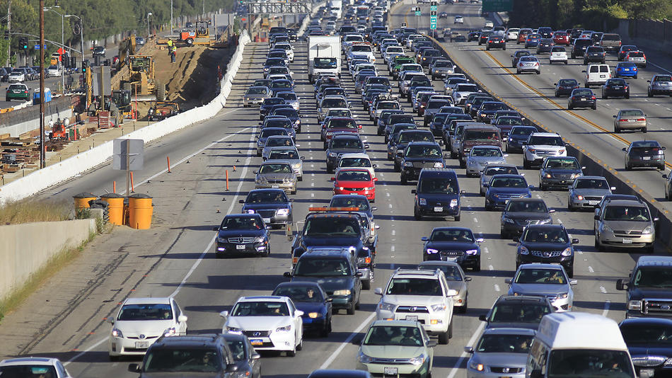 Traffic crawls along the northbound 405 Freeway during rush hour in Westwoo...