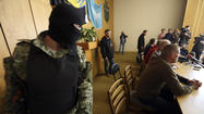 Captive observers in Ukraine meet journalists under eyes of gunmen
