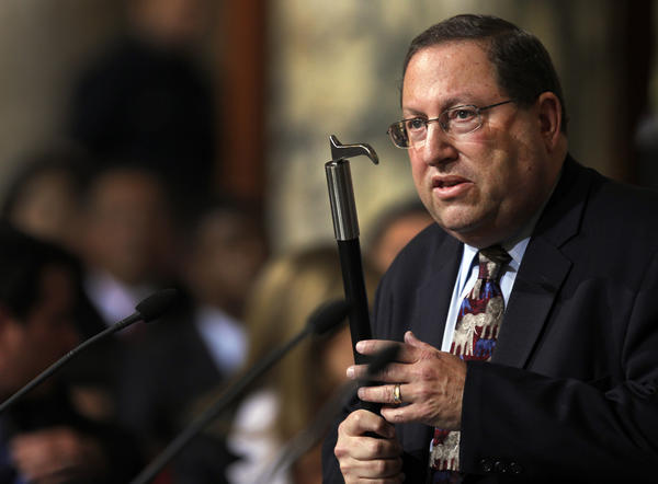 City Councilman Paul Koretz holds a bullhook as he argues for a ban on the use of such implements to train or control elephants in an October 2013 meeting at Los Angeles City Hall. 