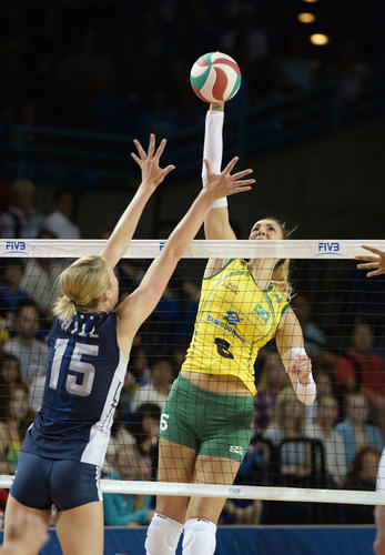 Brazil's Thaisa Menezes puts the ball away during the USA Volleyball Cup on Saturday.