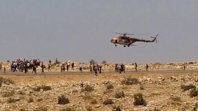Yazidis board helicopter aid flight