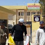 Iraqi Christians displaced by Sunni militants seek to flee abroad