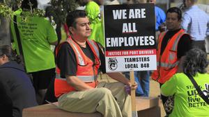 Port truckers drive home difference between contractors and employees