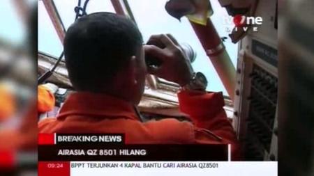 Search for missing AirAsia jetliner resumes in wider area - LA Times
