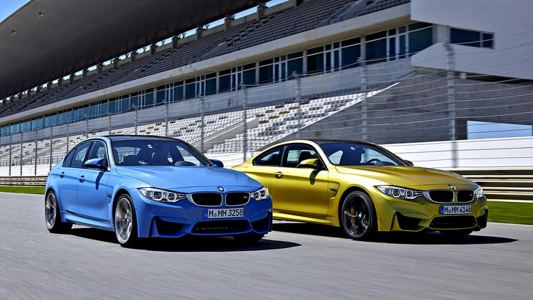 Joined at birth | The new BMW M3 sedan and its M4 twin2015 BMW M3 Sedan and M4 Coupe