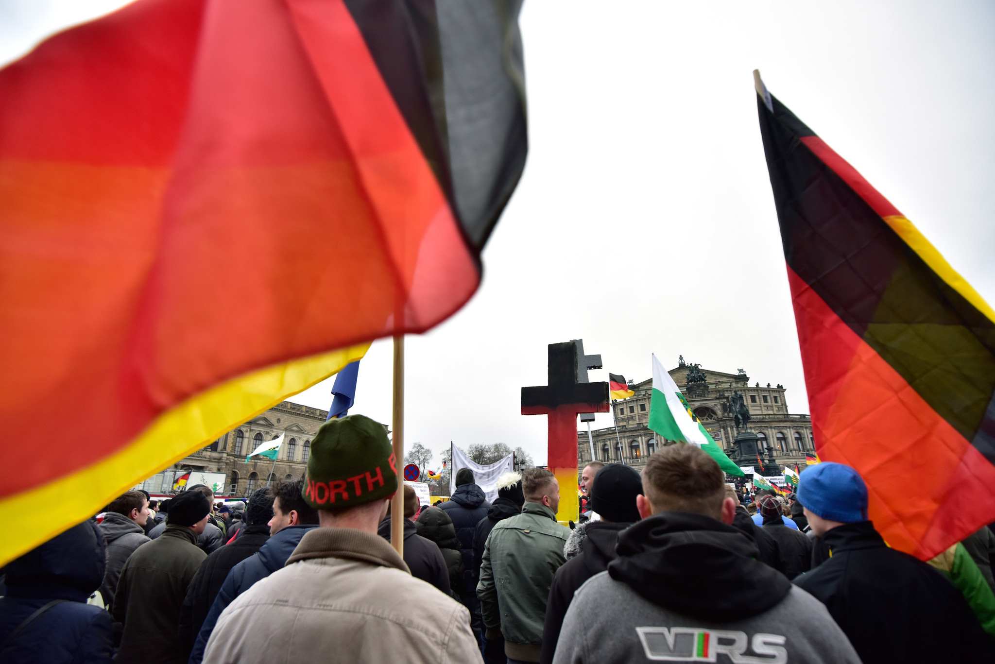 Anti-migrant group marches in Germany despite scandal
