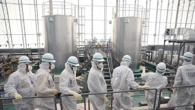 Inspectors urge Japan to dump water from Fukushima plant into ocean