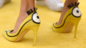Sandra Bullock rocks 'Minions' heels for charity at Los Angeles premiere