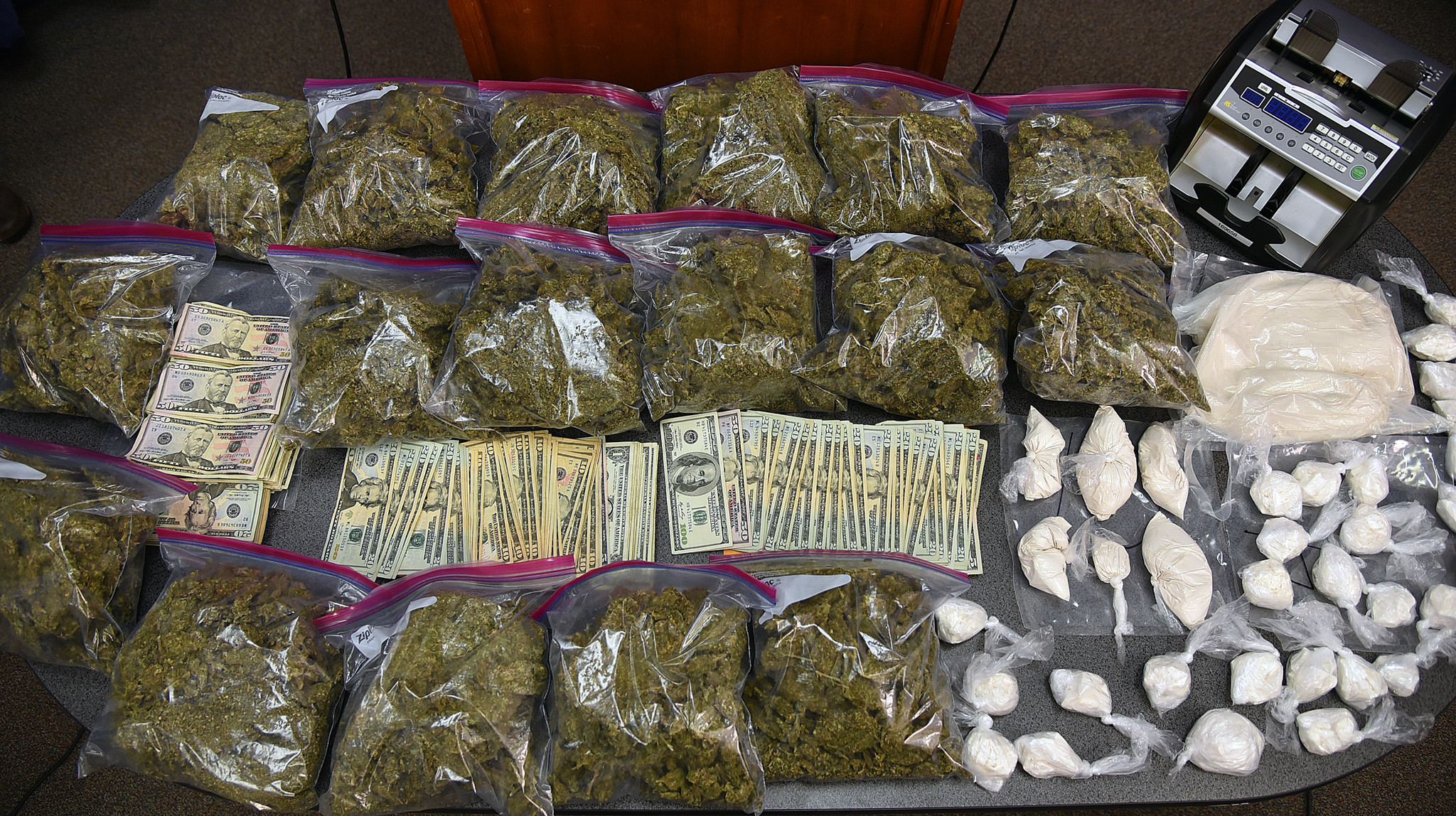 Drugs and money seized - Baltimore Sun