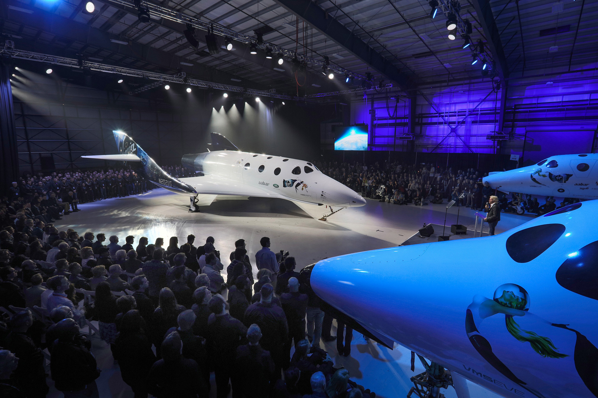 os-virgin-galactic-to-roll-out-new-space-tourism-rocket-plane-20160219
