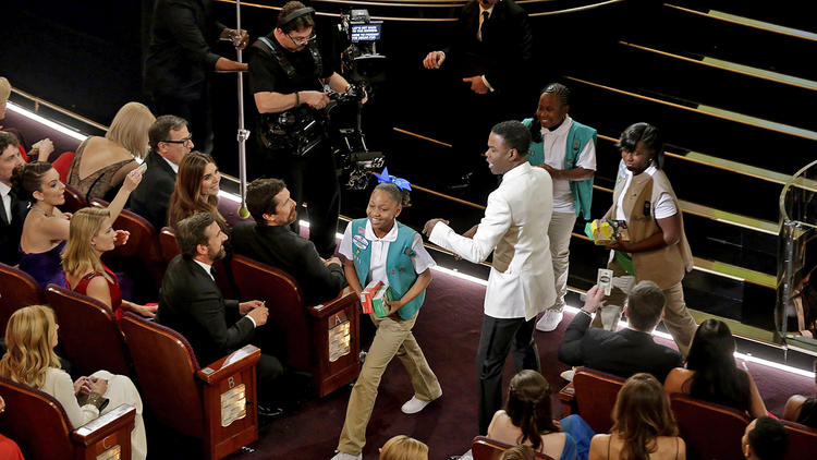 Robert Gauthier / Los Angeles Times. Chris Rock and Girl Scouts at 2016 Academy Awards.