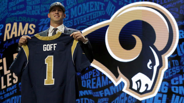 California quarterback Jared Goff poses for photos after being selected first overall in the NFL draft by the Rams. (Charles Rex Arbogast / Associated Press)