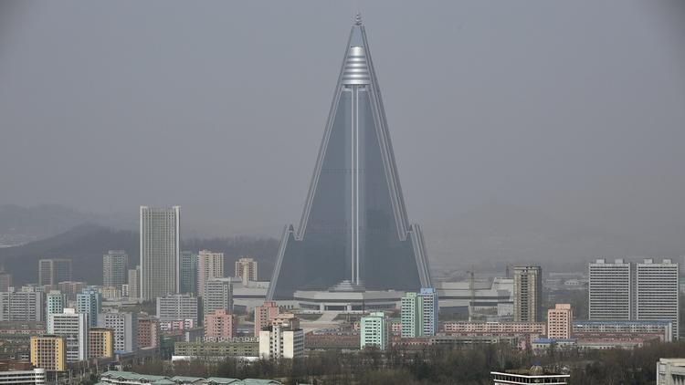 A view of Pyongyang, North Korea, featuring the massive, and unfinished, Ryugyong Hotel, on April 15, 2016.