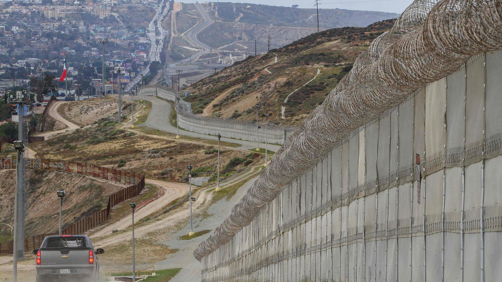 The border between Mexico, left, and the United States south of San Diego.  Photograph: Bill Wechter/Agence France-Presse/Getty Images.