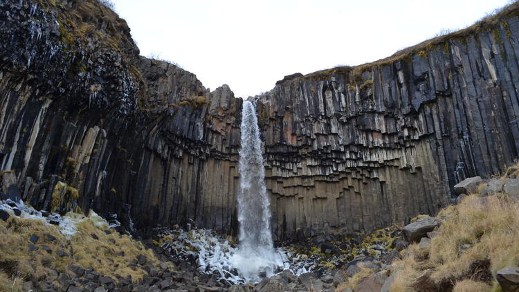 In Iceland, Black Falls is surrounded by basalt columns. The rock reacts with carbon dioxide, eventually turning it to a limestone-like solid as part of a slow natural process.