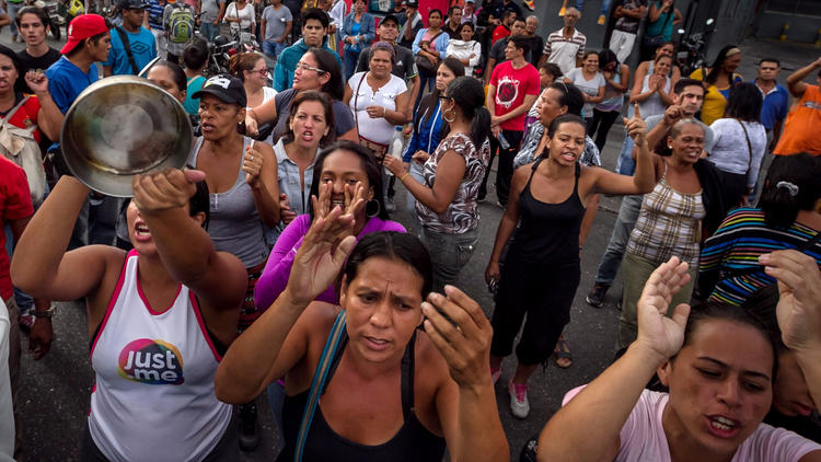 Demonstrators decry food shortages during a protest in the Catia district of Caracas, Venezuela.