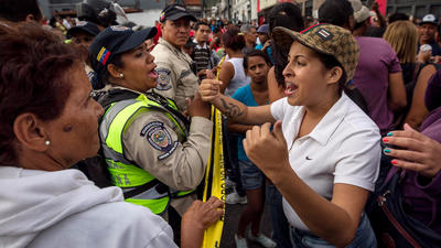 Looting and unrest continue roiling Venezuela as shortages persist and protesters demand food