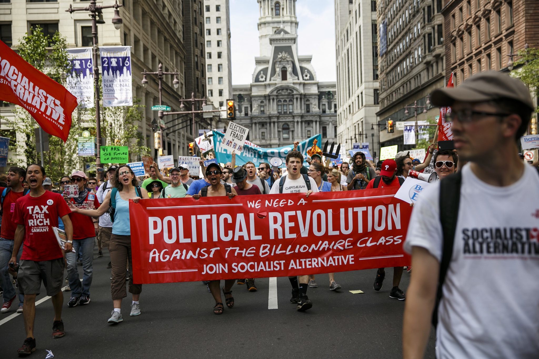 Bernie Sanders supporters march down Broad Street in Philadelphia on Sunday.