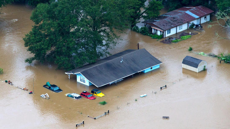 Aerial photo of homes along the flooded Tangipahoa River in Louisiana.