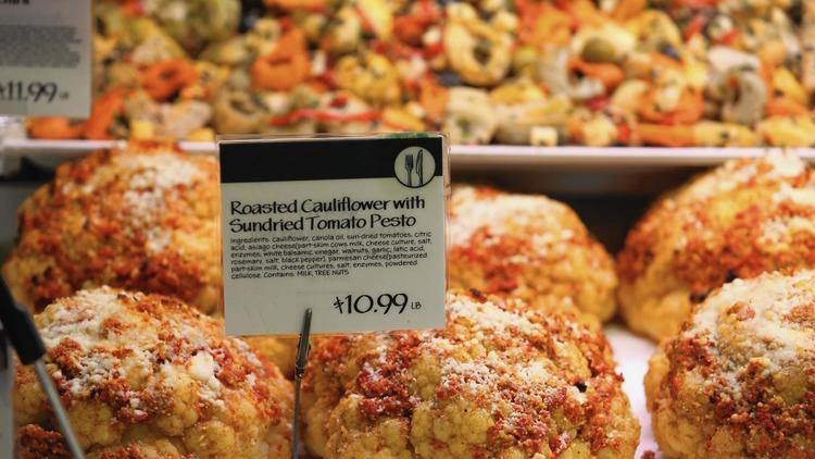 Grocery stores, like Whole Foods, continue to offer restaurant style prepared foods.