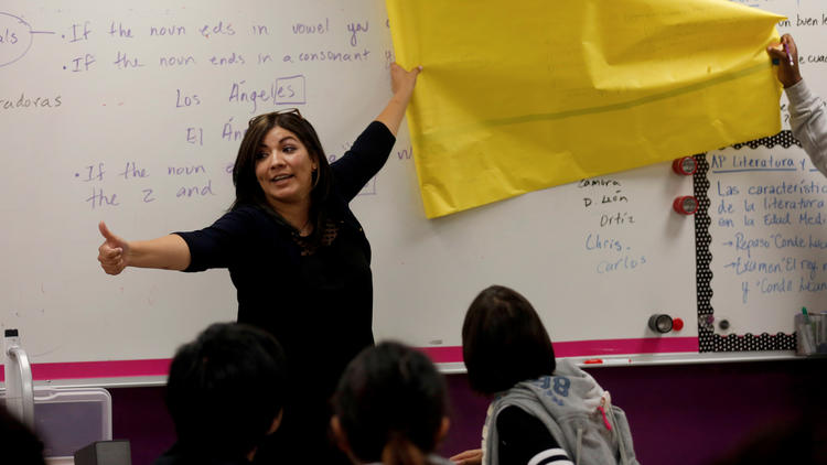 Teacher Viviane Barrios instructs her class at Downtown Magnets High School in August.