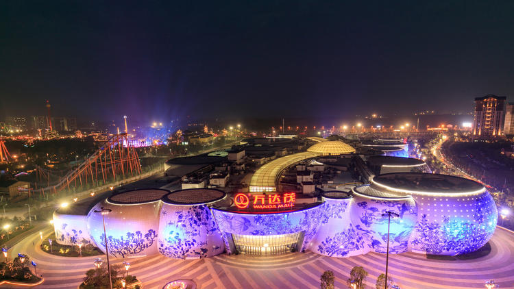 The world's first Wanda Mall and theme park demonstration zone made by Wanda Group is illuminated on Sept. 3, 2016, in Nanchang, Jiangxi Province, in China.
