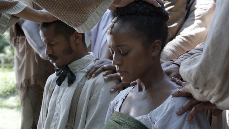 Nate Parker as Nat Turner and Aja Naomi King as Cherry in a scene from "The Birth of a Nation."