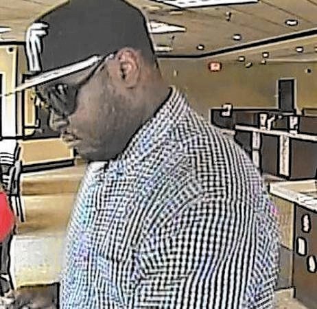 Serial bank robber hits Midlothian bank for second time