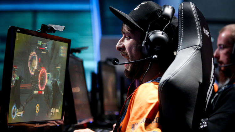 A player reacts during a match at ELeague's "Overwatch" Open in September.