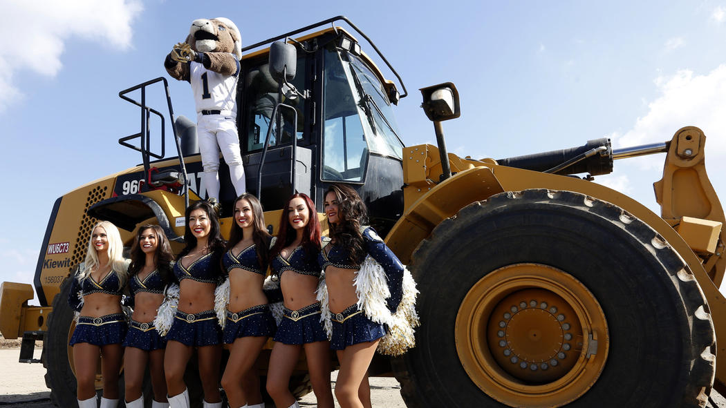 Rams cheerleaders and mascot attend a groundbreaking ceremony for the team's new stadium in Inglewood on Nov. 17, 2016.