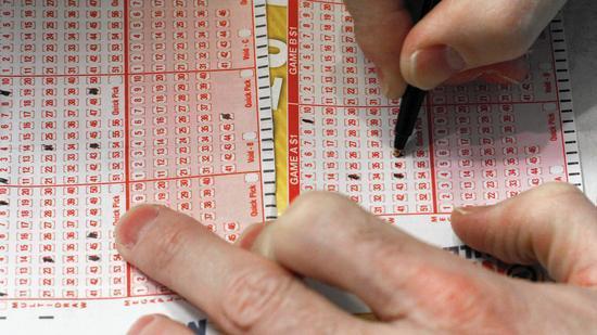 Oak Park man checks old Powerball tickets, wins $100,000