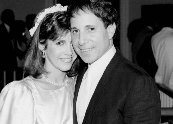 Carrie Fisher, then 26, and Paul Simon, 41, in 1983 after being wed in a private ceremony. (Mario Suriani / Associated Press)
