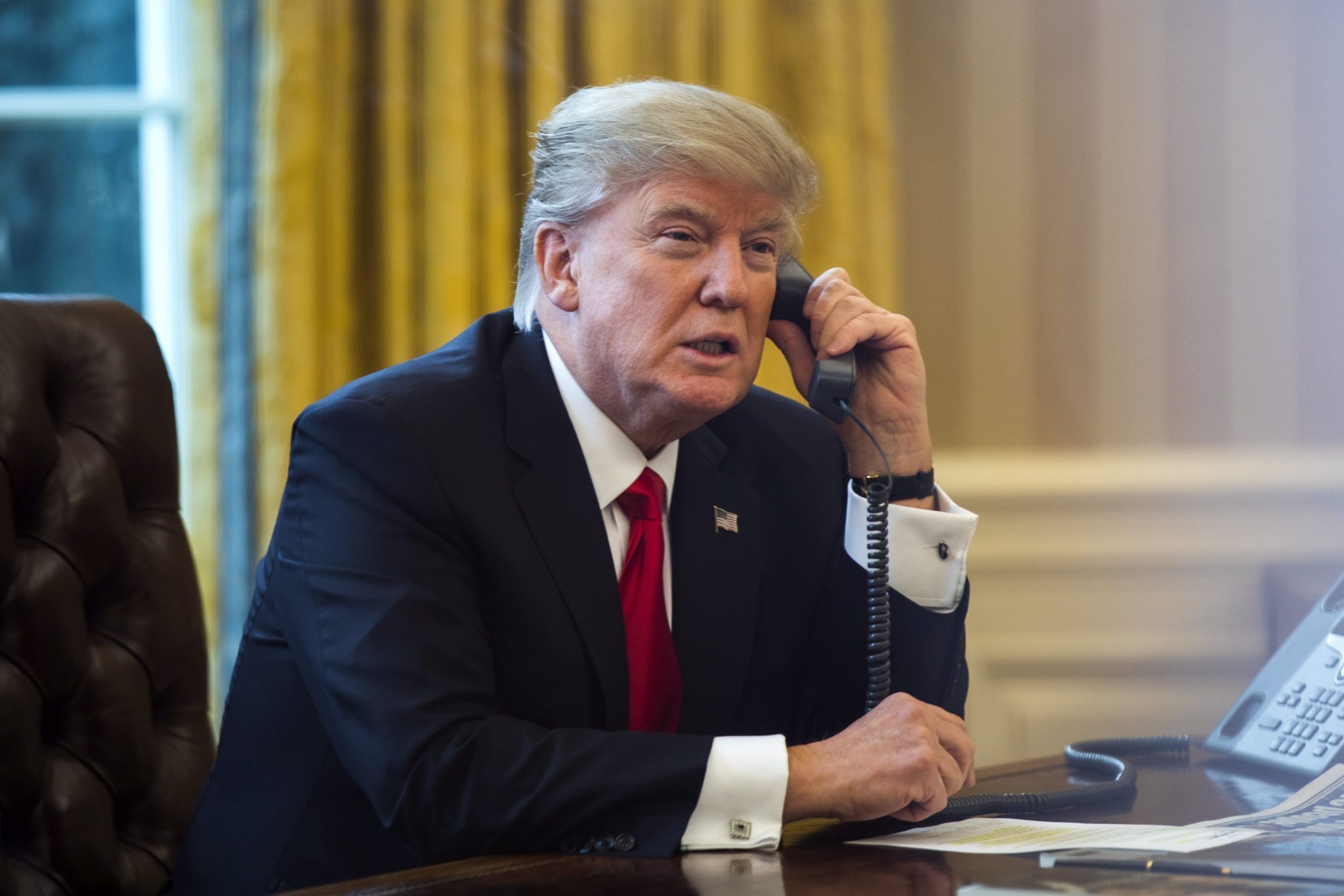 Image result for photo of trump on the phone
