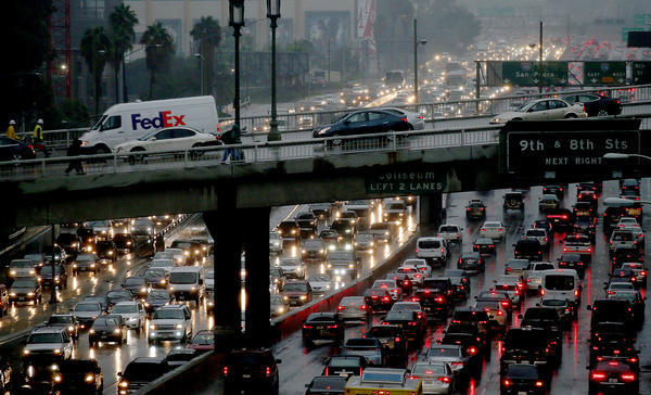 Freeways and major roads flooded by rainwater - Los Angeles Times