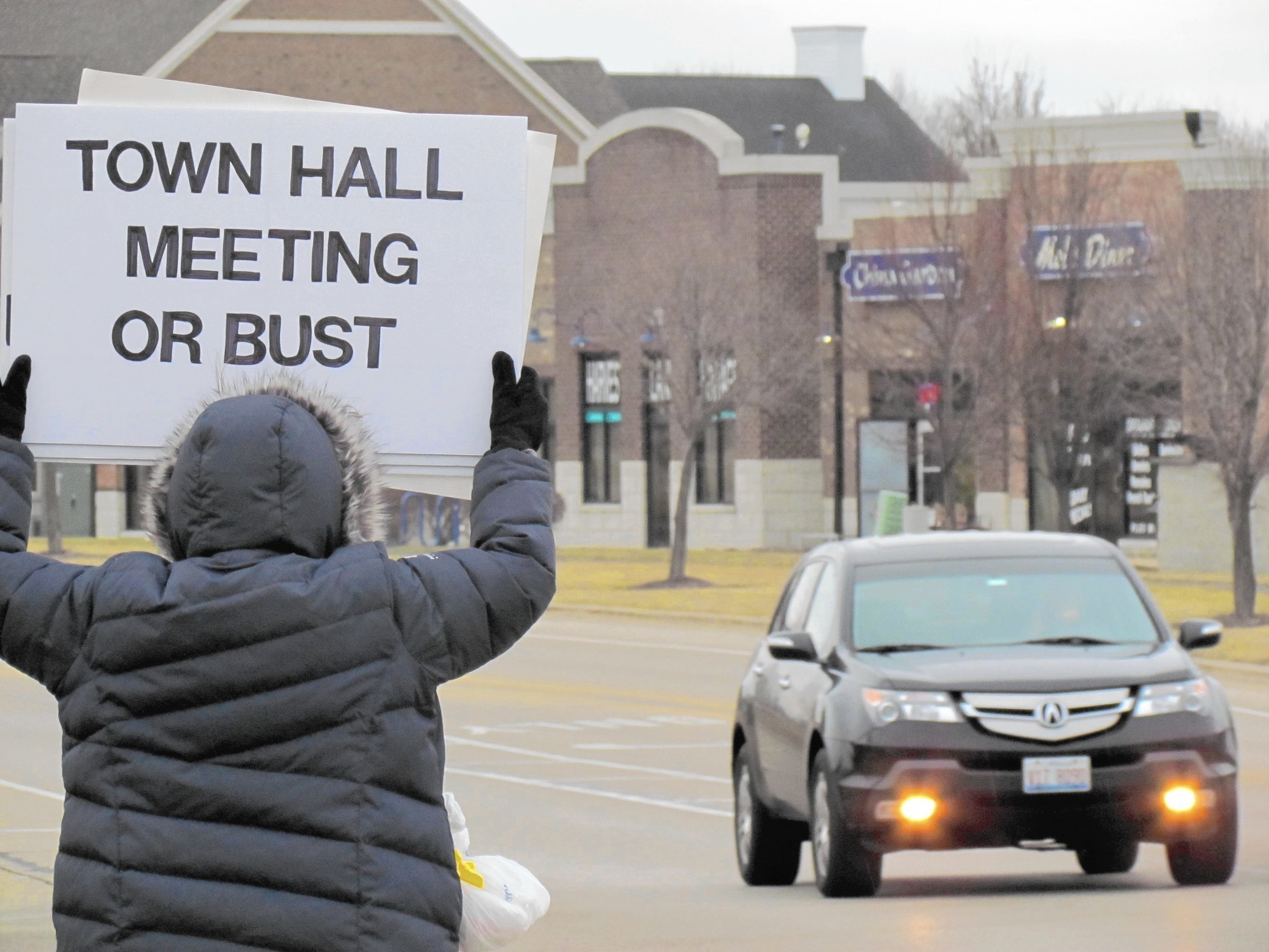 Protesters call for town hall meeting; Hultgren says they follow a 'playbook' to disrupt