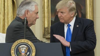 President Trump shakes hands with Rex Tillerson, left, after Tillerson was sworn in as secretary of State on Feb. 1.