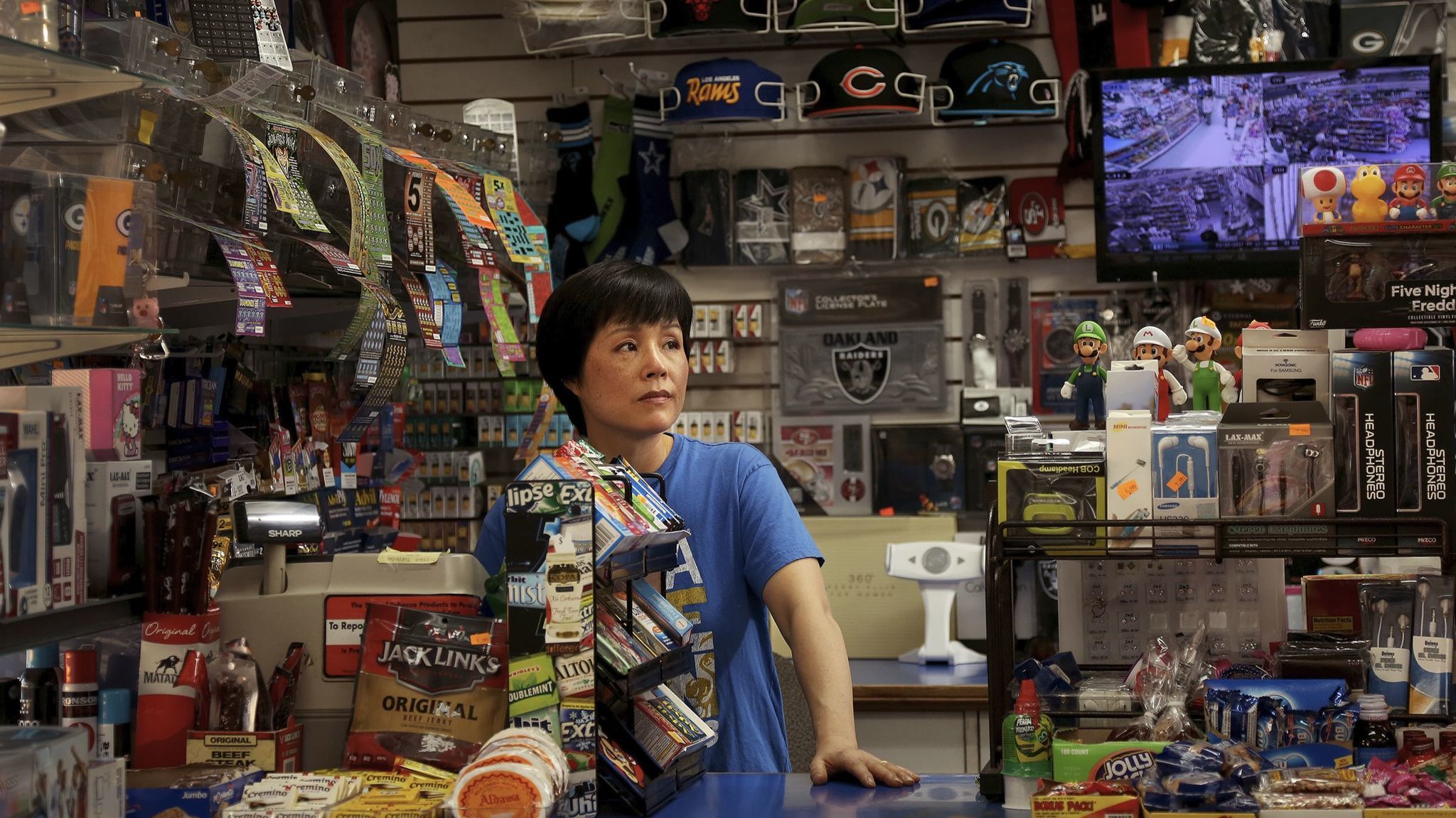 Sue Kim and her husband run a small convenience store along Cesar E. Chavez Avenue in Boyle Heights. The business has been in the family almost 40 years.