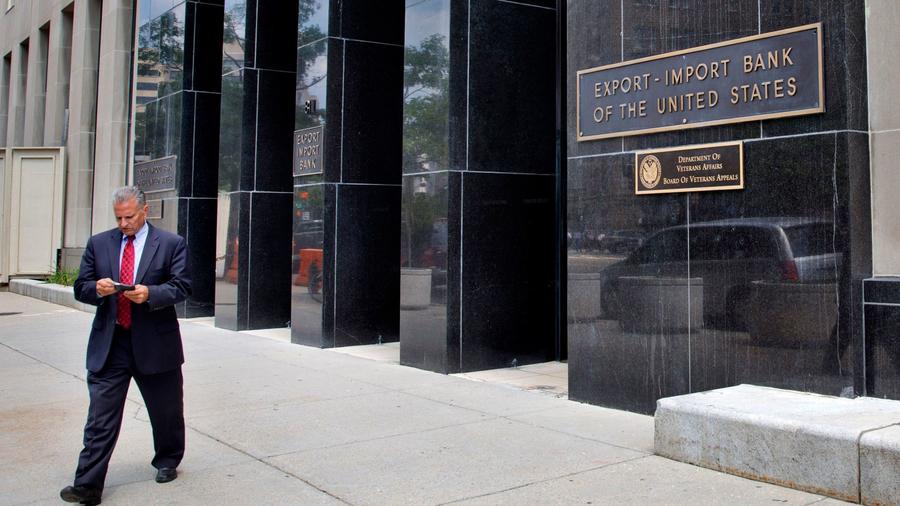 A man walks out of the Export-Import Bank of the U.S., Tuesday, July 28, 2015, in Washington. The fe