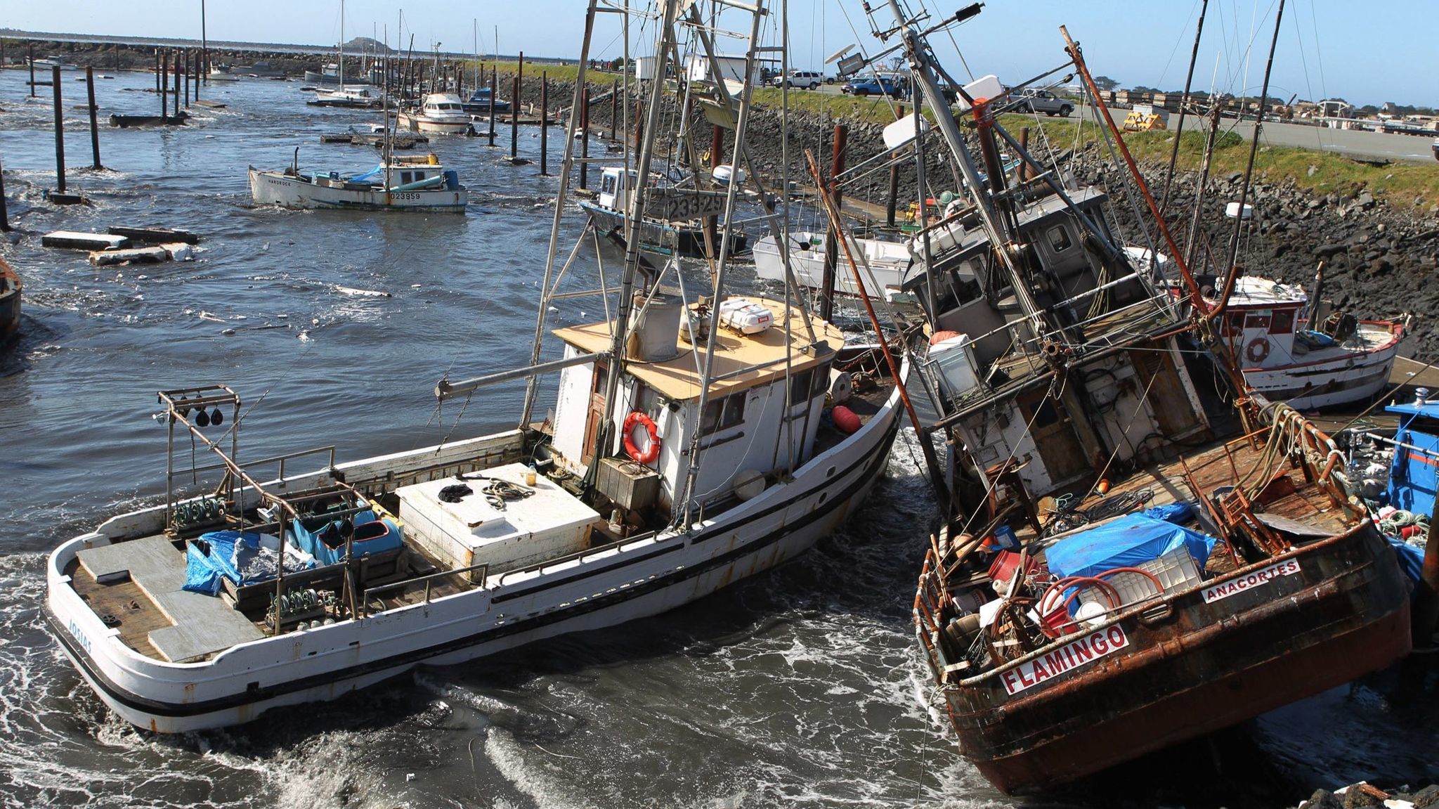 In this March 11, 2011 file photo, boats collide with one another after a tsunami swept through a boat basin in Crescent City, Calif.