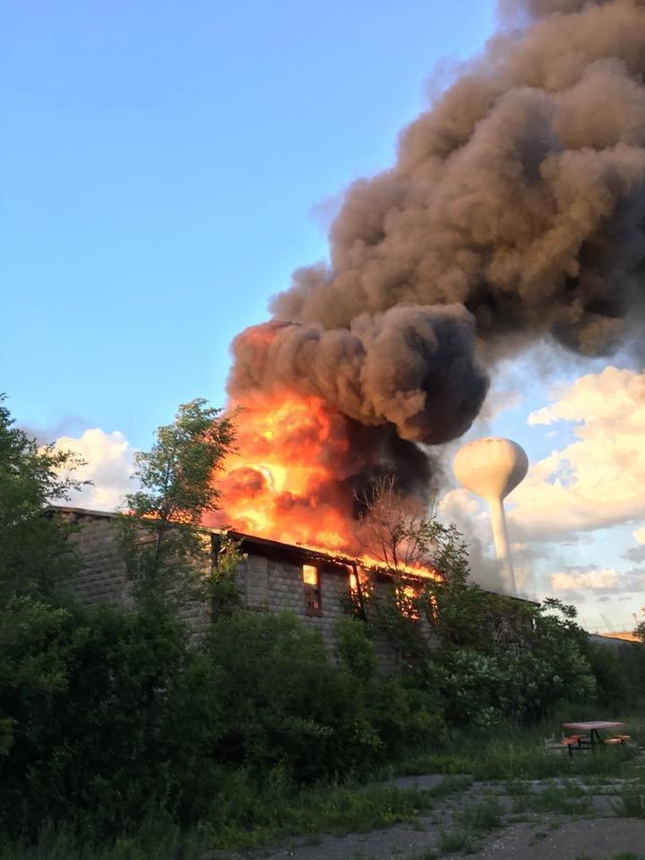 Industrial building inside old Joliet prison complex catches fire, official says