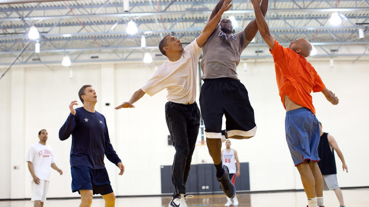 Then-President Barack Obama plays basketball
