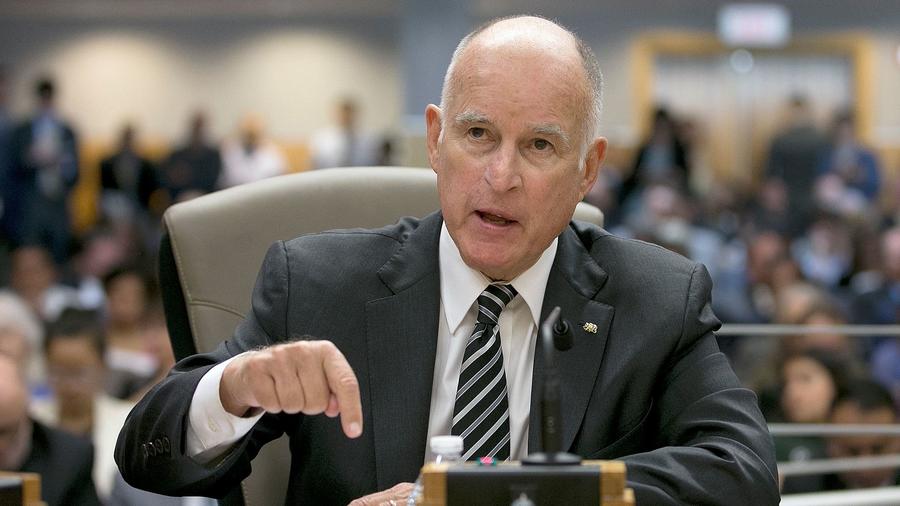 California Governor Jerry Brown testifies on Thursday before the Senate Environmental Quality Committee, arguing for his embattled cap-and-trade climate control legislation. — Photograph: Rich Pedroncelli/Associated Press.